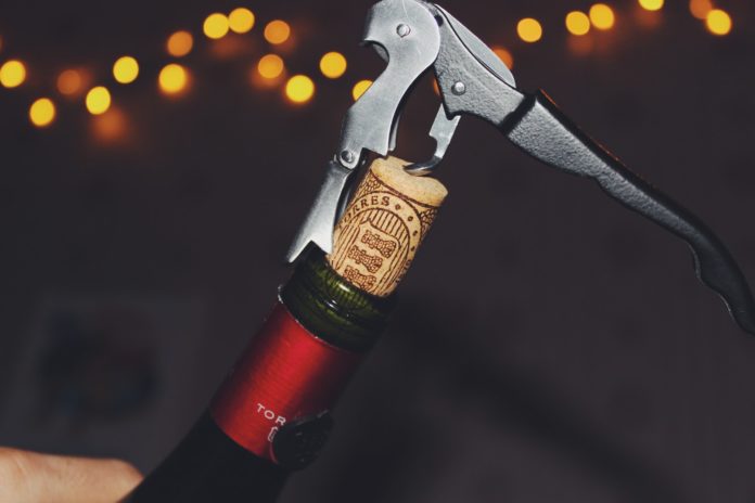 Opening wine bottle corks