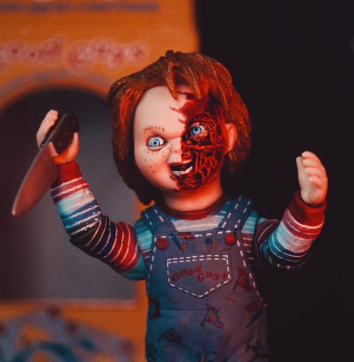 Chucky puppet holding knife