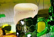 This Green Beer Will Get You In The St. Patrick’s Day Spirit Green beer next to a pretzel